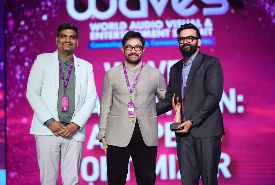 Receiving WAVES 2025 Hackathon award from Aamir Khan